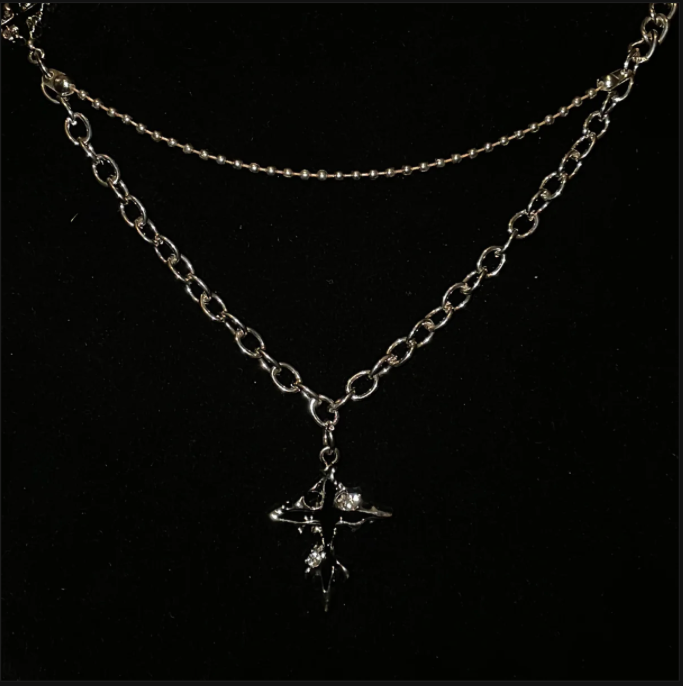 Naszyjnik z Topniejącym Krzyżem