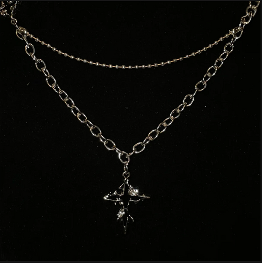 Naszyjnik z Topniejącym Krzyżem
