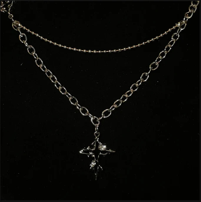 Naszyjnik z Topniejącym Krzyżem