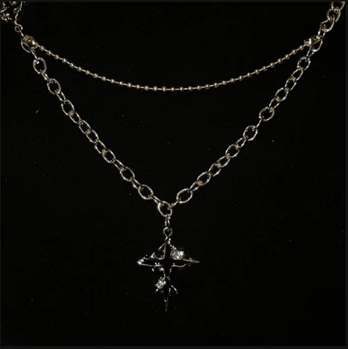 Naszyjnik z Topniejącym Krzyżem