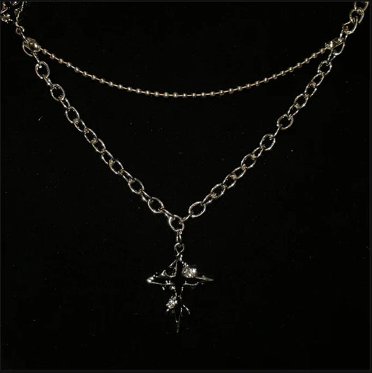 Naszyjnik z Topniejącym Krzyżem